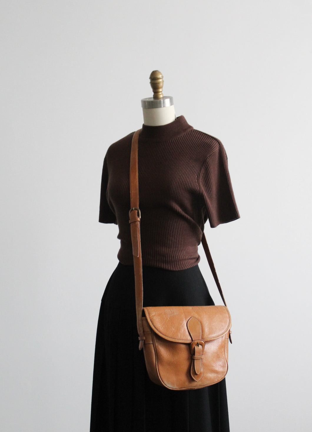 cognac leather saddle bag