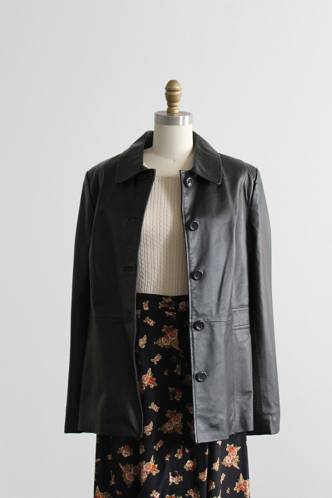 button-front black leather jacket