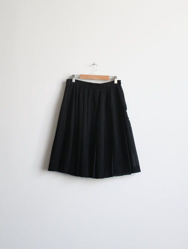pleated black mini skirt