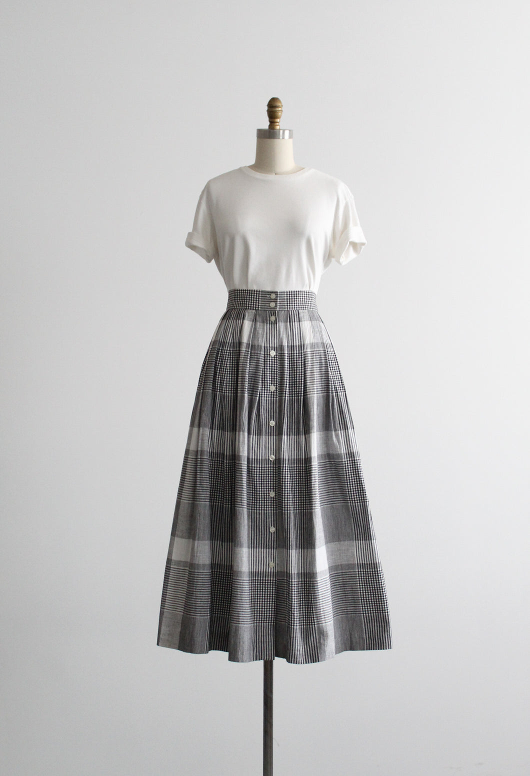 checkmate midi skirt