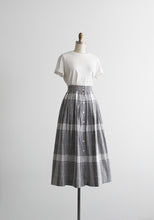 checkmate midi skirt