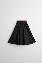 flared black midi skirt
