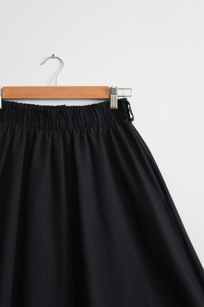 flared black midi skirt