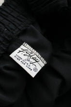 flared black midi skirt