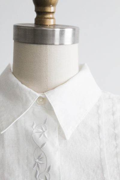 camilla sleeveless button up