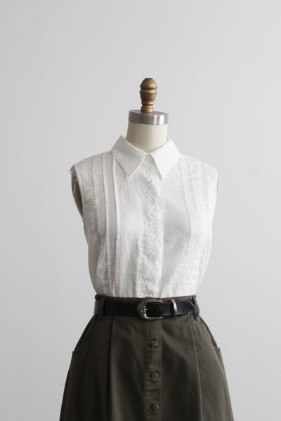 camilla sleeveless button up