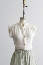 woven parchment button up