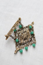 filigree teardrop brooch