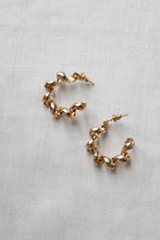 curl goldtone hoops