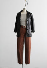 button-front black leather jacket