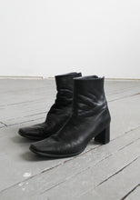 buttersoft black leather square-toe boots