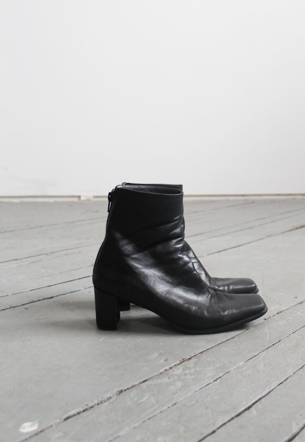 buttersoft black leather square-toe boots