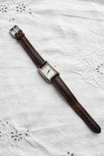 leather band vintage watch