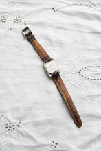 leather band vintage watch