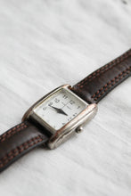 leather band vintage watch