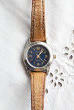 leather band vintage watch