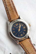 leather band vintage watch