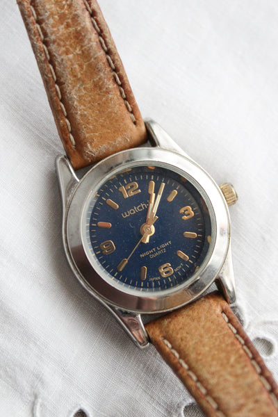 leather band vintage watch