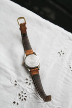 leather band vintage watch