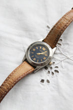 leather band vintage watch