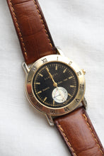 leather band vintage watch