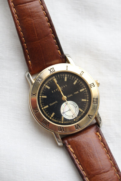 leather band vintage watch