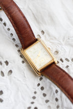 leather band vintage watch