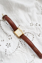 leather band vintage watch