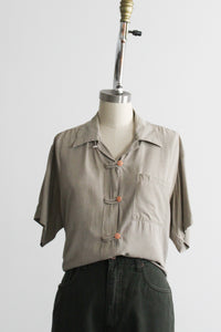 stone button up
