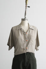 stone button up