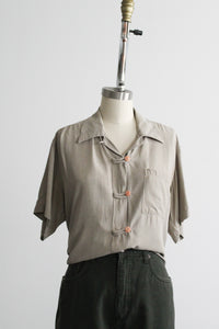 stone button up