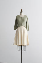 eggshell wool pleated skirt